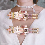 Boucles Casse-Noisette : paire pendante de Noël, détails dorés, strass et perles synthétiques