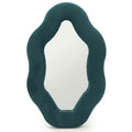 Miroir ovale irrégulier avec cadre en velours bleu-vert